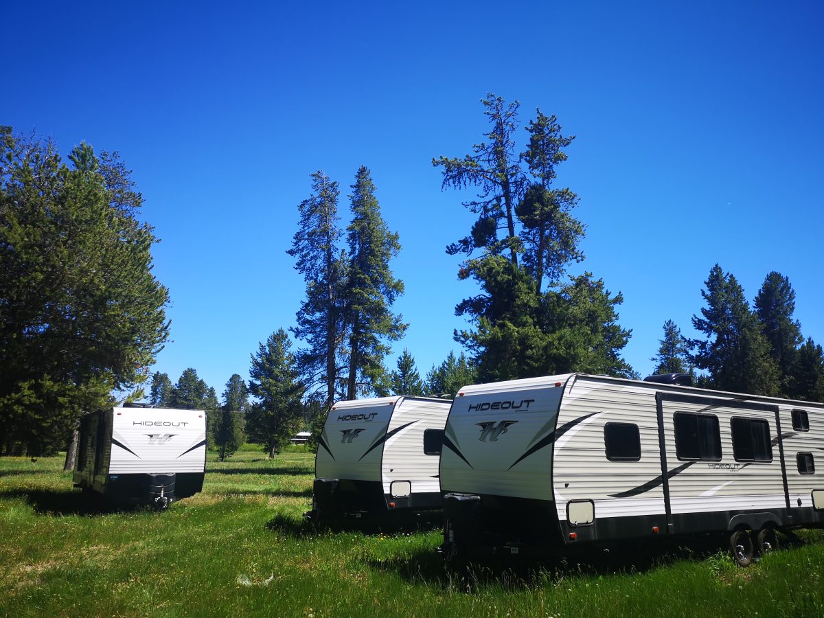 Yellowstone Hideout travel trailers in a green meadow